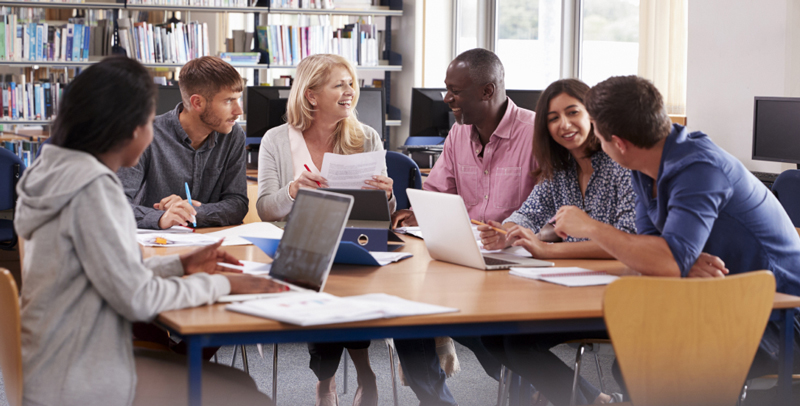 a group of diverse individuals engaged in a collaborative discussion